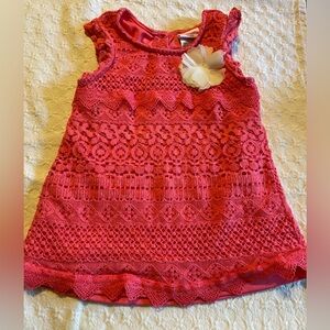 Girls sz 4T dress. Salmon colored lined crochet-look dress. White flower L chest